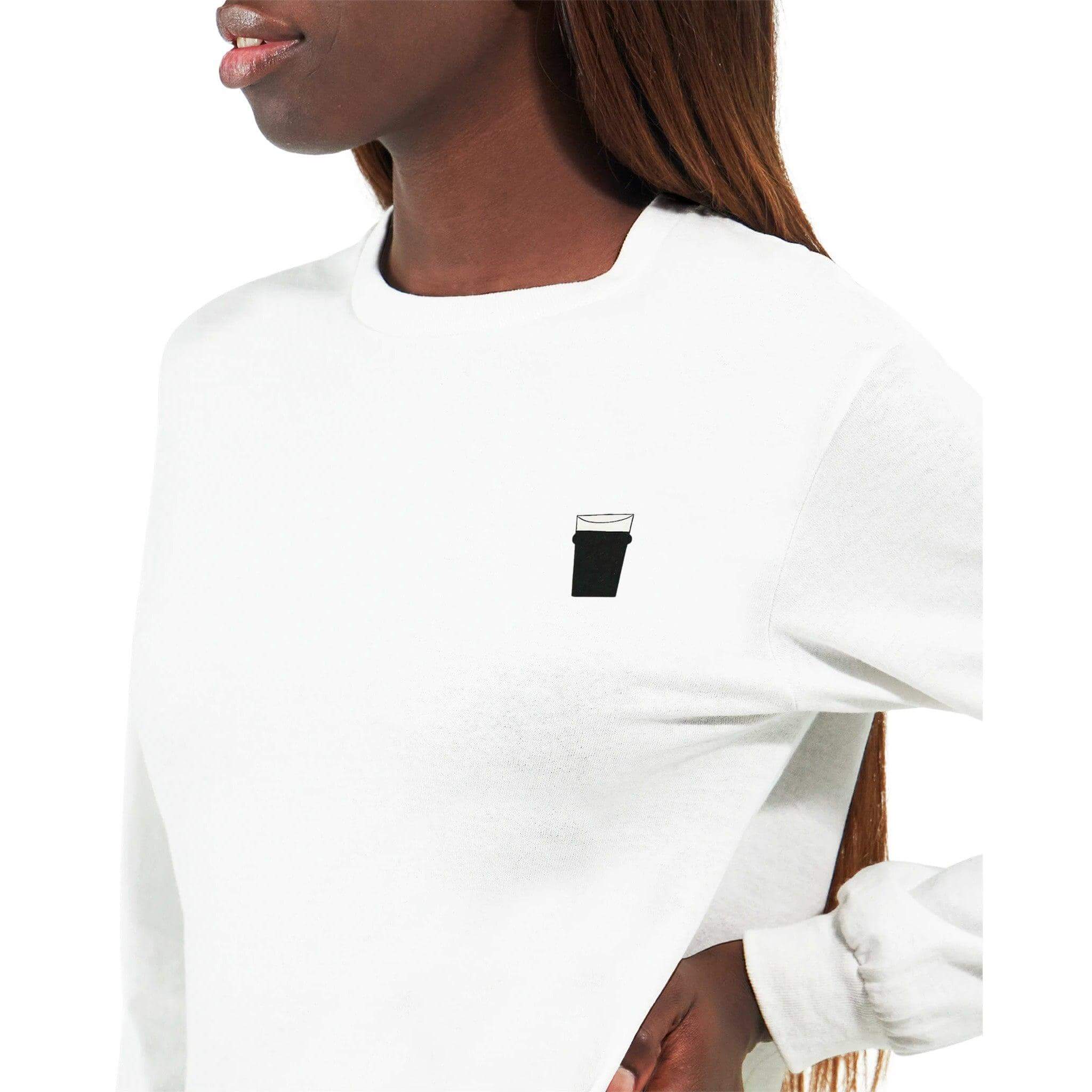 Model showcasing Pint of Plain Unisex Long Sleeve T-Shirt with pint glass graphic on chest, perfect for beer lovers.