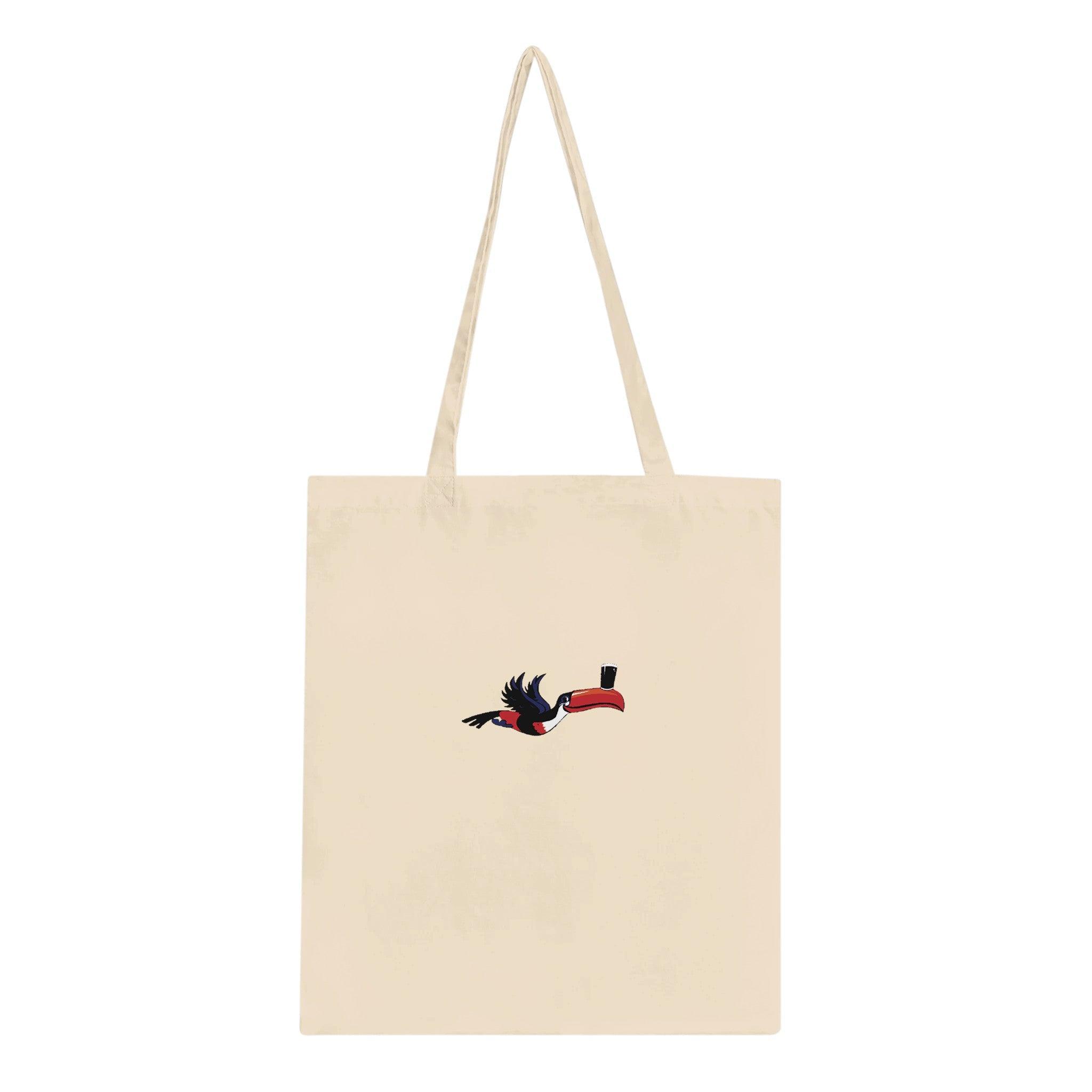 Premium Black Shtuff Tote Bag featuring a bird carrying a Guinness pint, perfect for Guinness lovers.