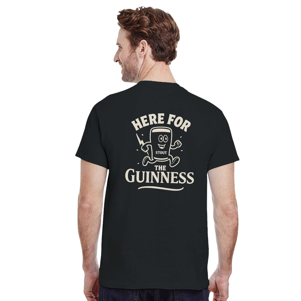 Man wearing a black 'Here for the Guinness' stout cartoon graphic tee from the back, perfect for beer lovers.