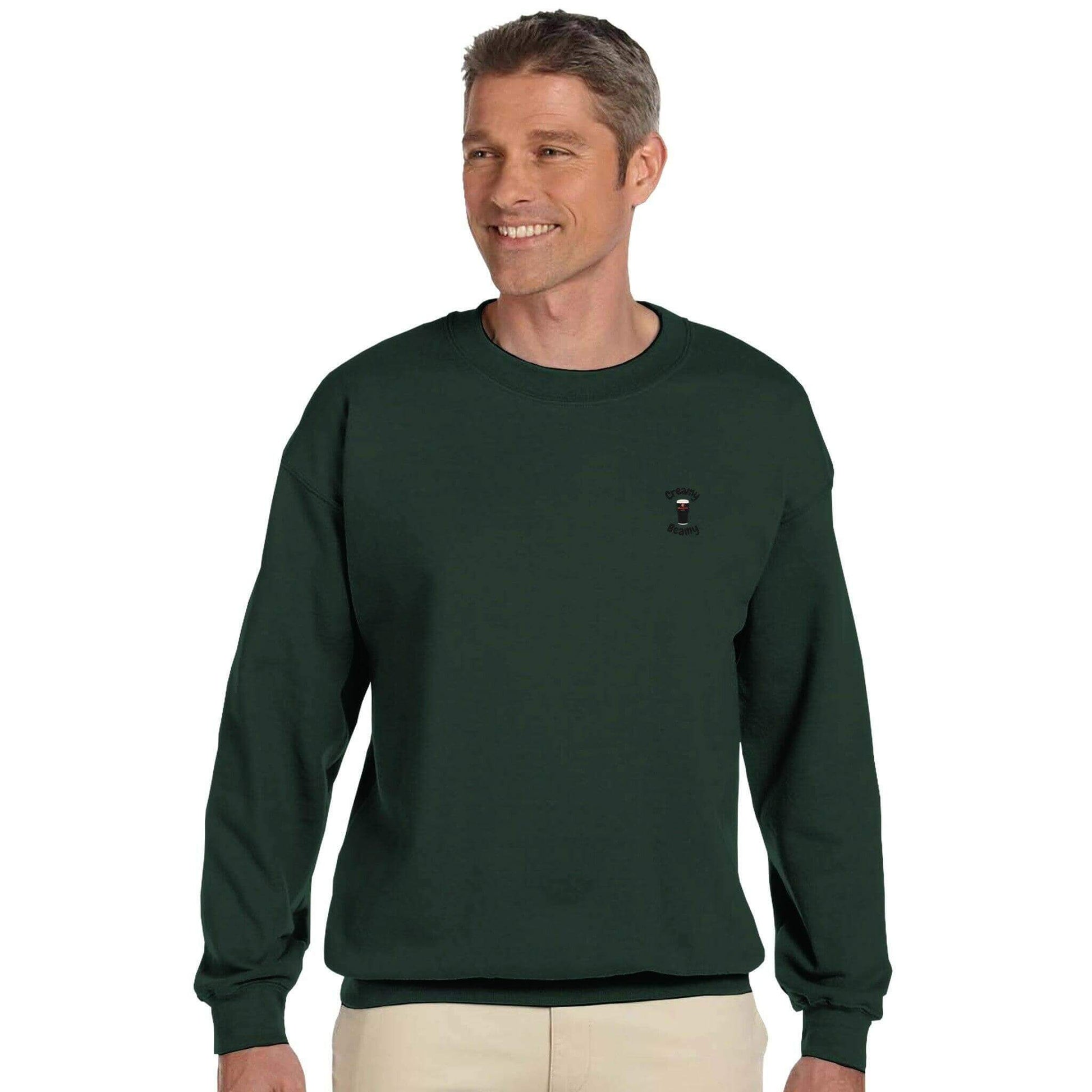 Man wearing a green Creamy Beamy Beamish Irish Stout sweatshirt, perfect for cozy casual outings.