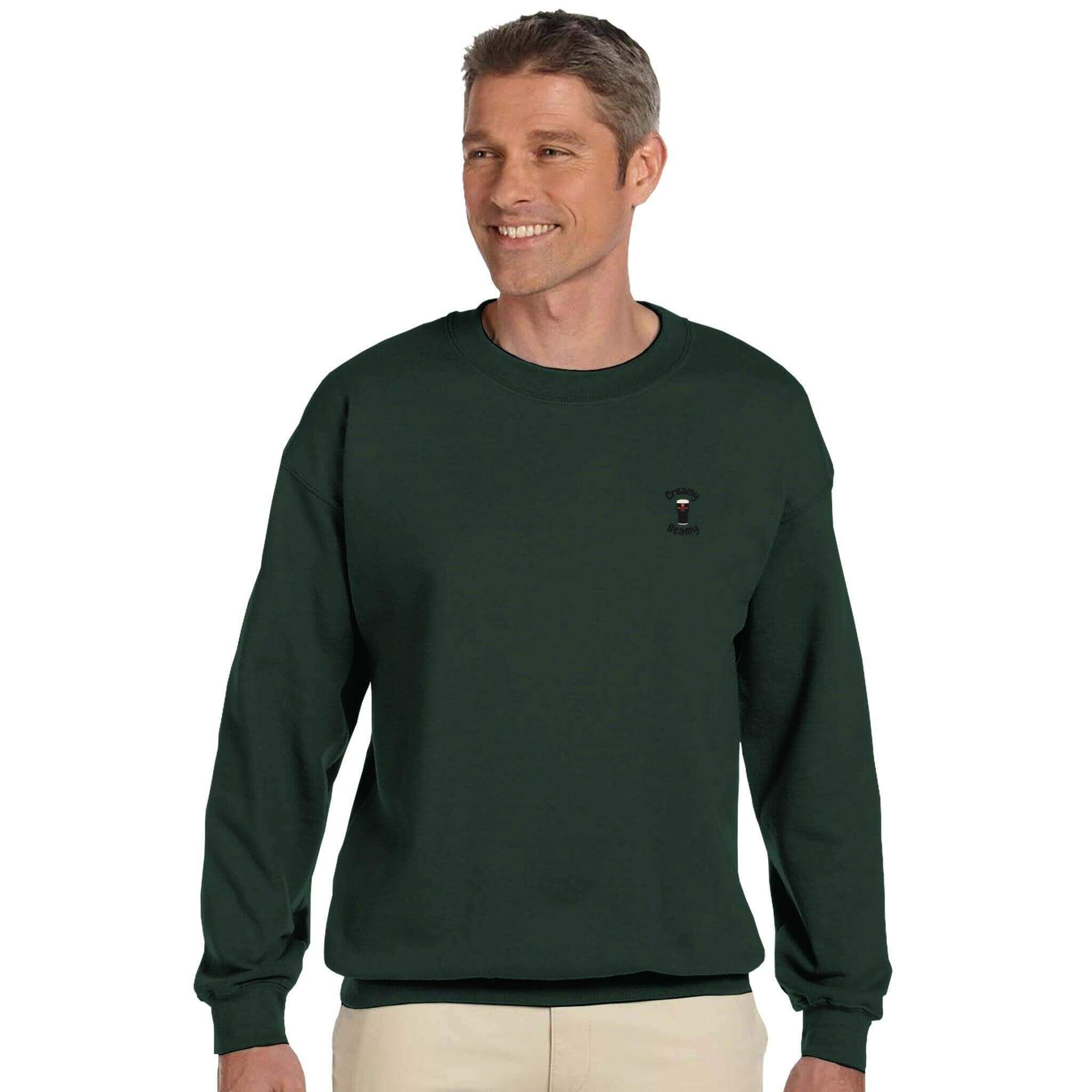 Man wearing a green Creamy Beamy Beamish Irish Stout sweatshirt, perfect for cozy casual outings.