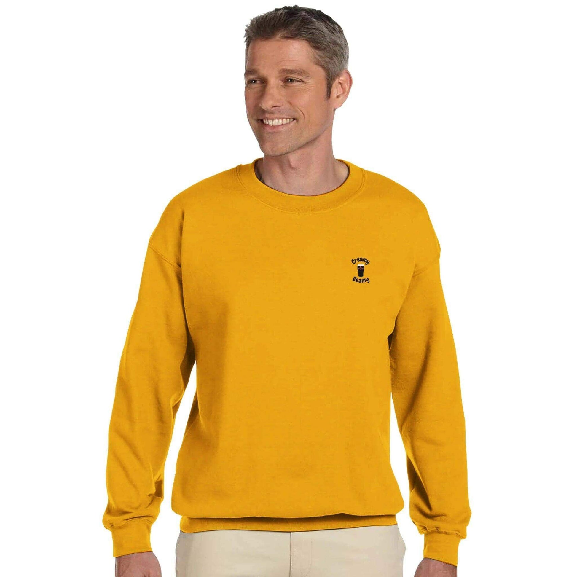 Man wearing a vibrant yellow sweatshirt, showcasing casual comfort and style for all stout lovers.