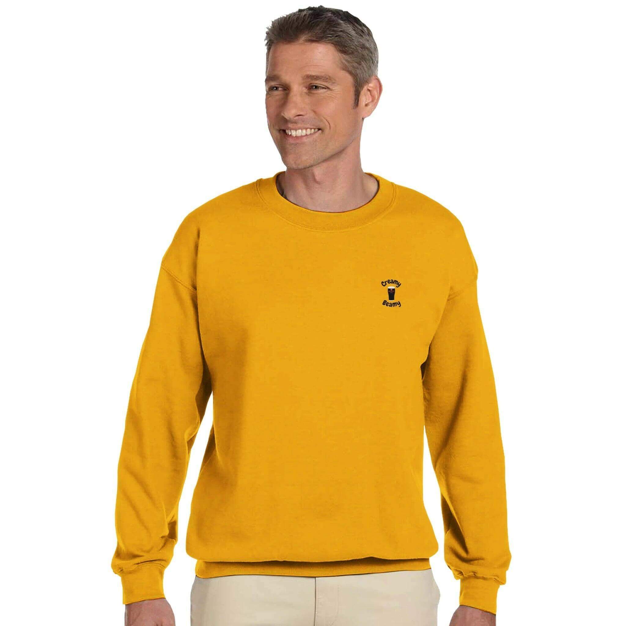 Man wearing a vibrant yellow sweatshirt, showcasing casual comfort and style for all stout lovers.