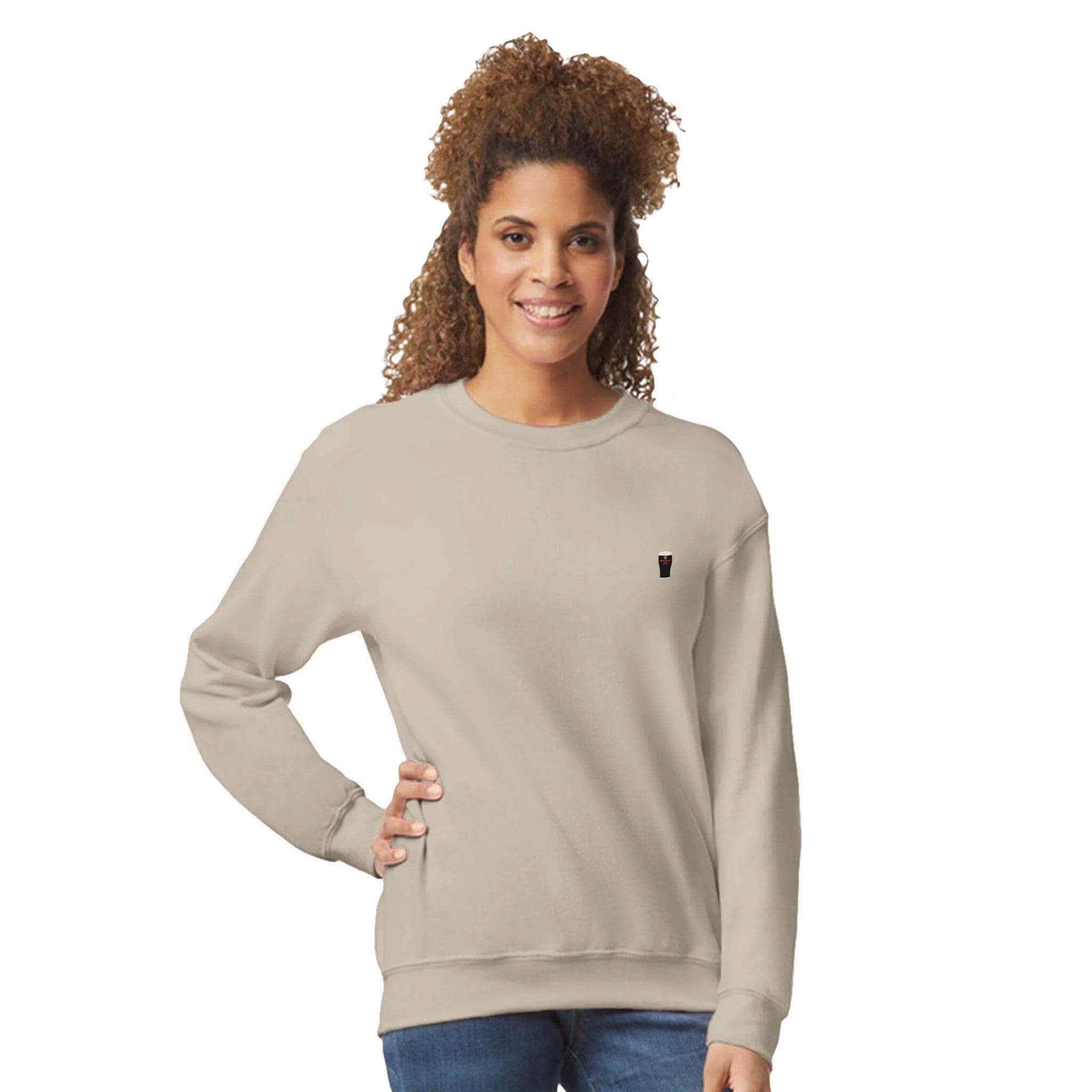 Woman wearing Creamy Beamy Irish Stout sweatshirt, celebrating Beamish with comfort and style.