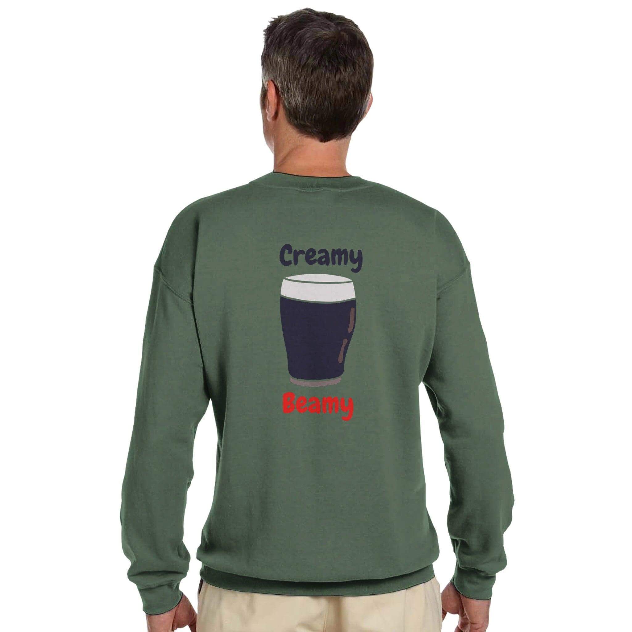 Back view of a man wearing a Creamy Beamy Irish Stout sweatshirt featuring a pint graphic.