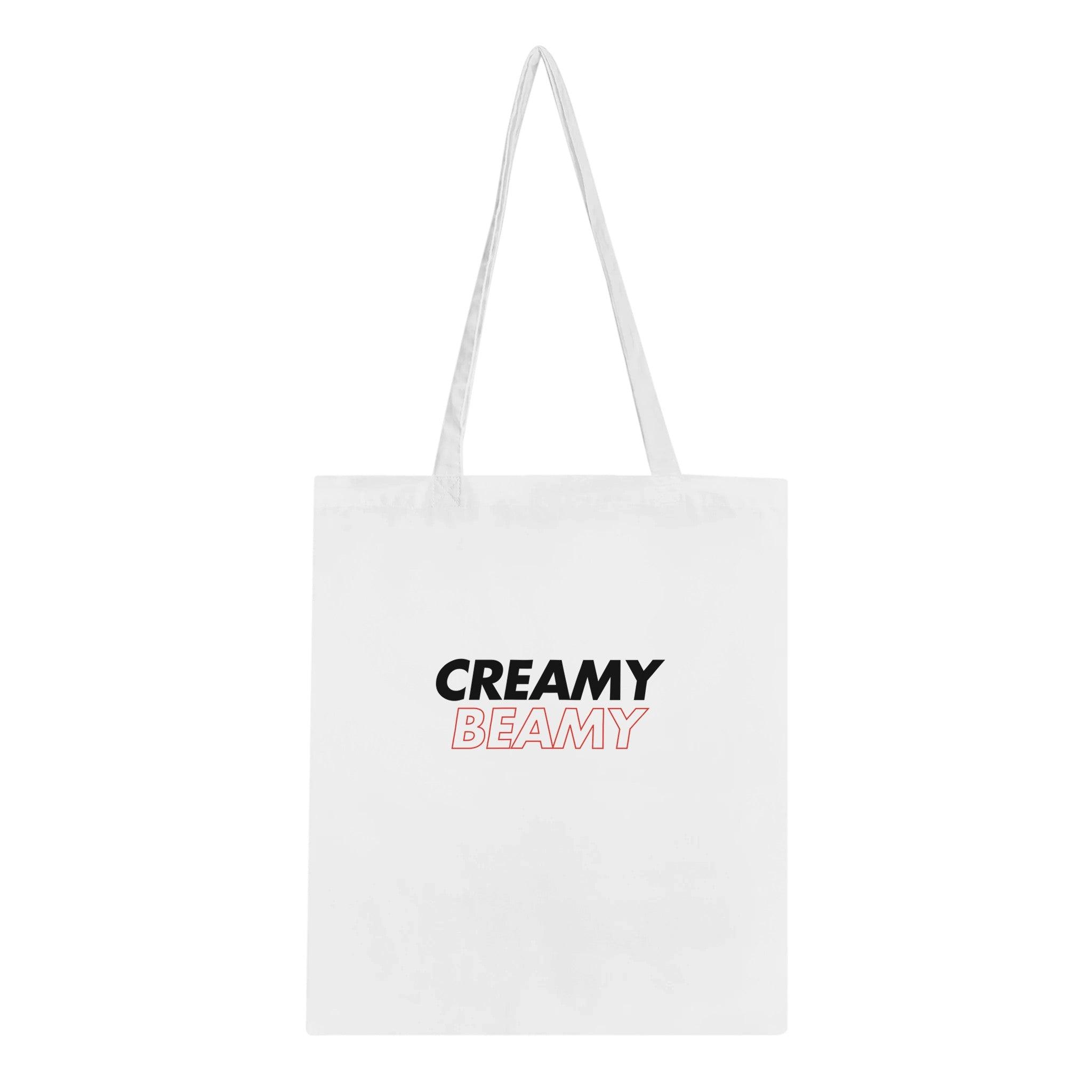 Creamy Beamy Tote Bag featuring bold text, perfect for showcasing your love for Beamish Irish Stout.