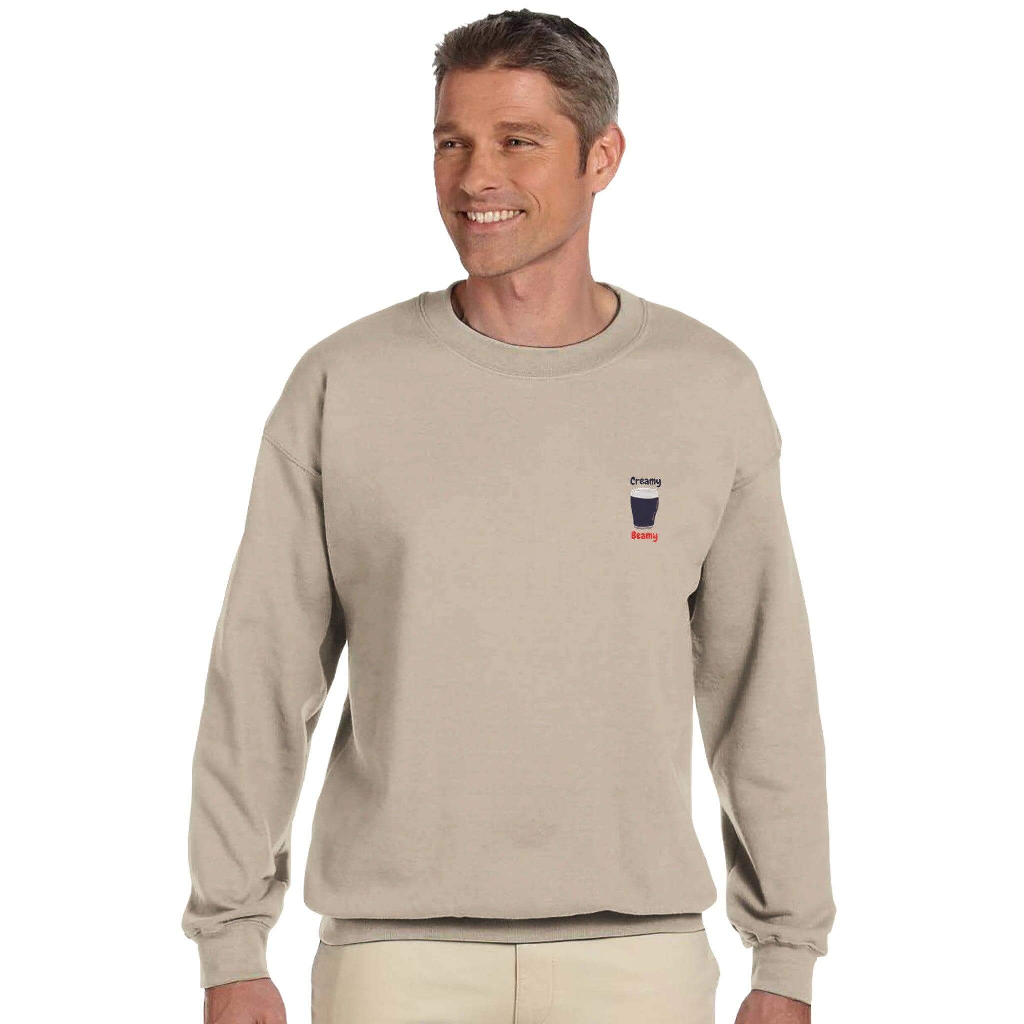 Man wearing Creamy Beamy's Jumper, a premium sweatshirt for Beamish Stout lovers, in a soft beige color.