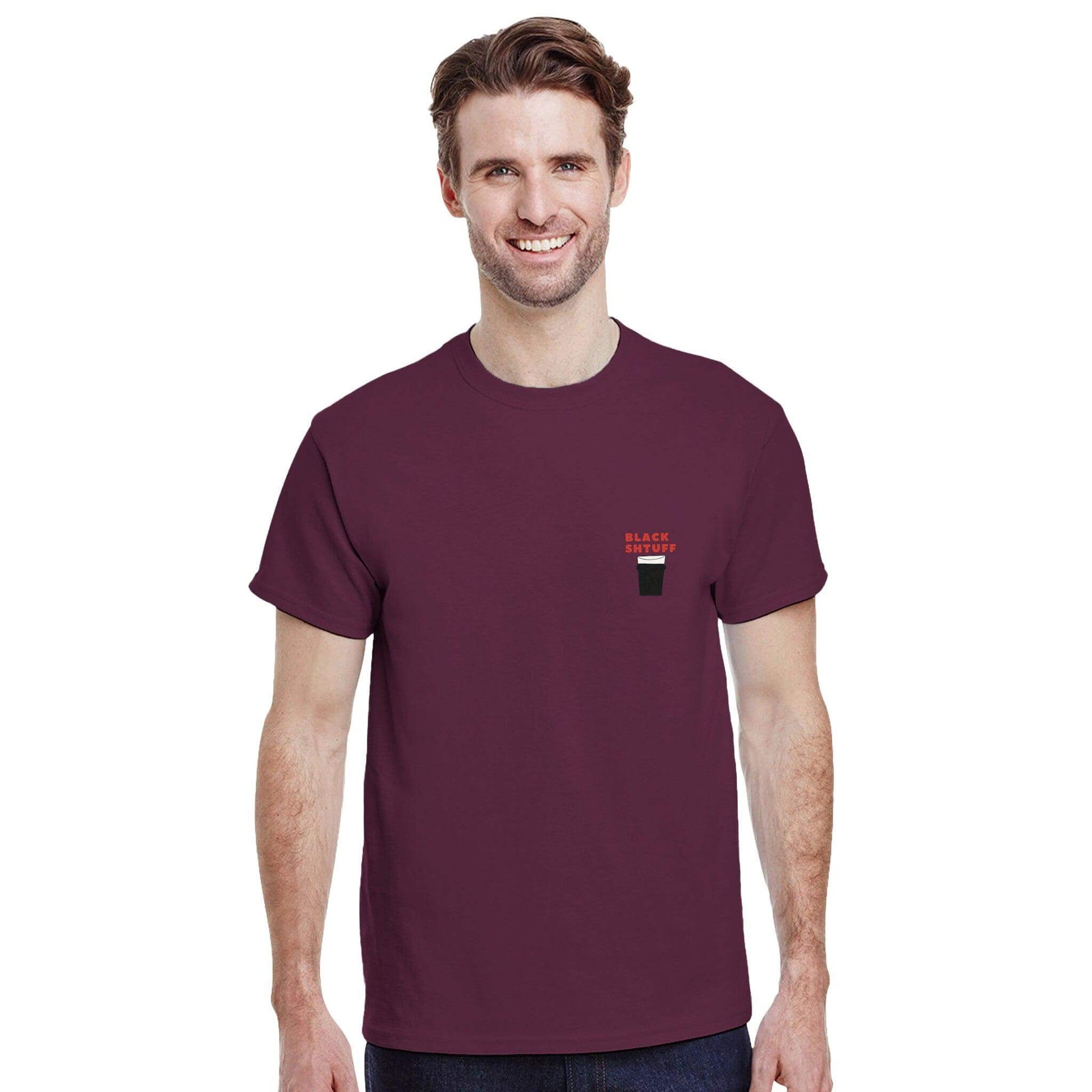 Man wearing a maroon Guinness Lover's T-Shirt featuring pint design, showcasing love for the iconic beverage.