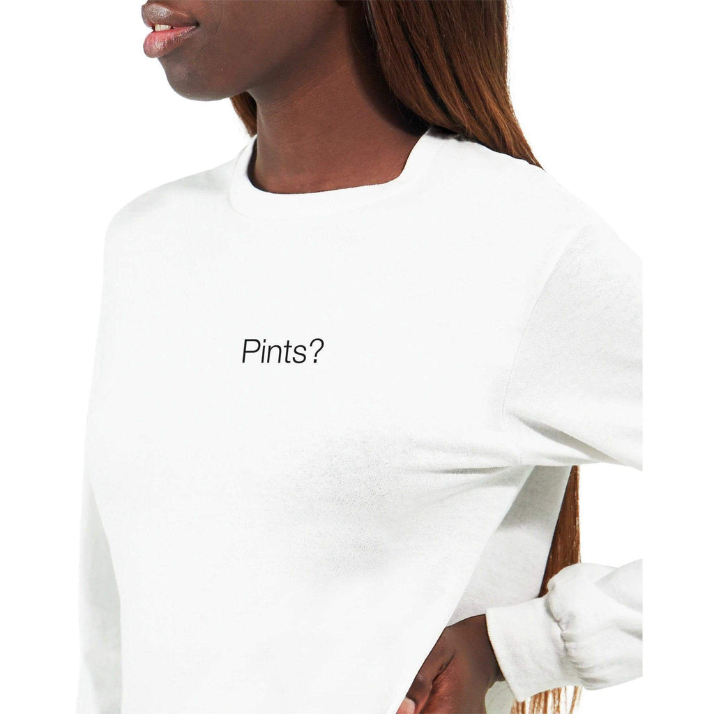 Model wearing Pints? Unisex Long Sleeve T-Shirt in white, perfect for brew lovers and casual outings.